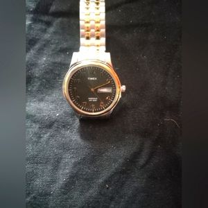 Timex day date gold and silver colored metal band